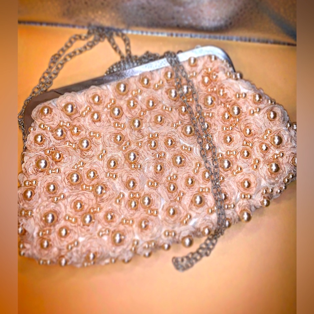 Floral and pearl clutch